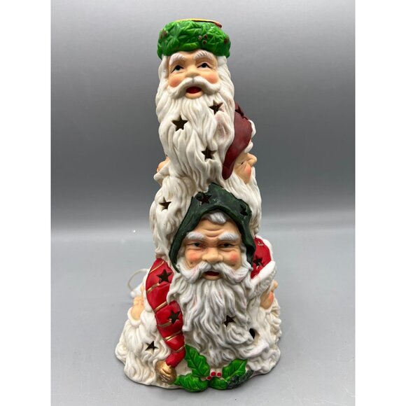 The Many Faces of Santa Lighted Figurine - Picture 15 of 16